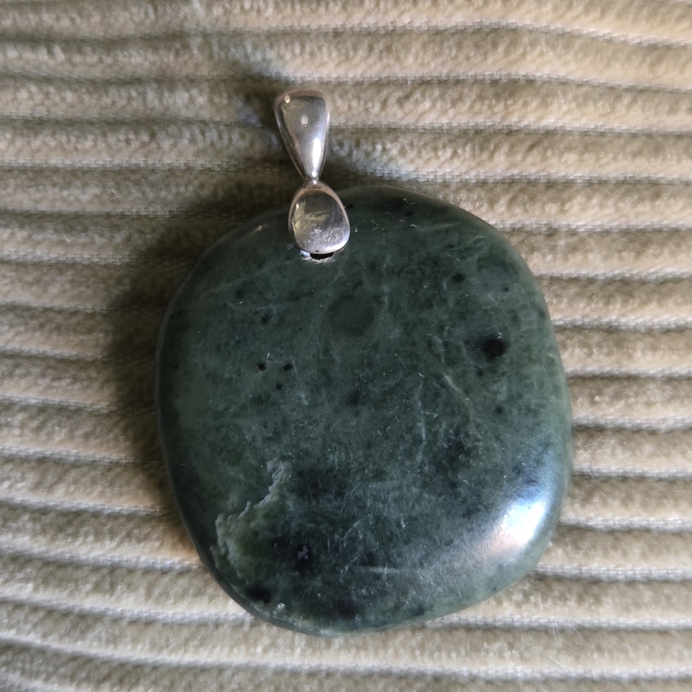 Elegant Green Stone Pendant with Silver Accent
